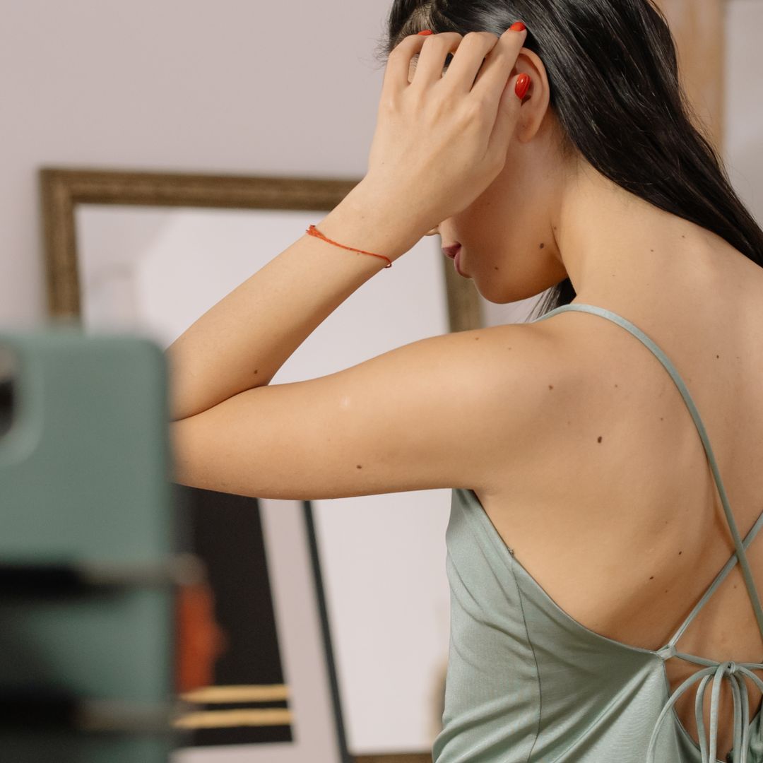 Woman filming with a smartphone camera