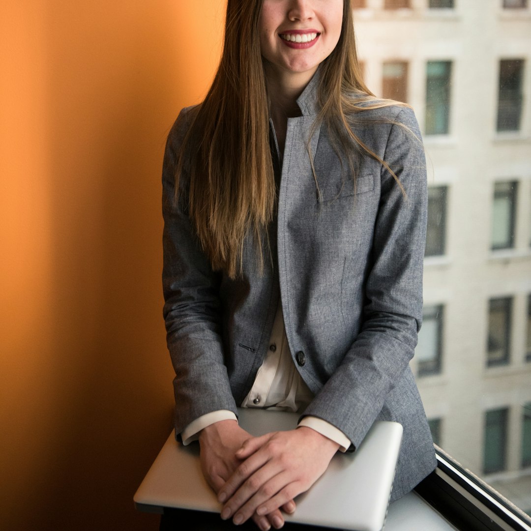 Professional woman smiling confidently in an office
