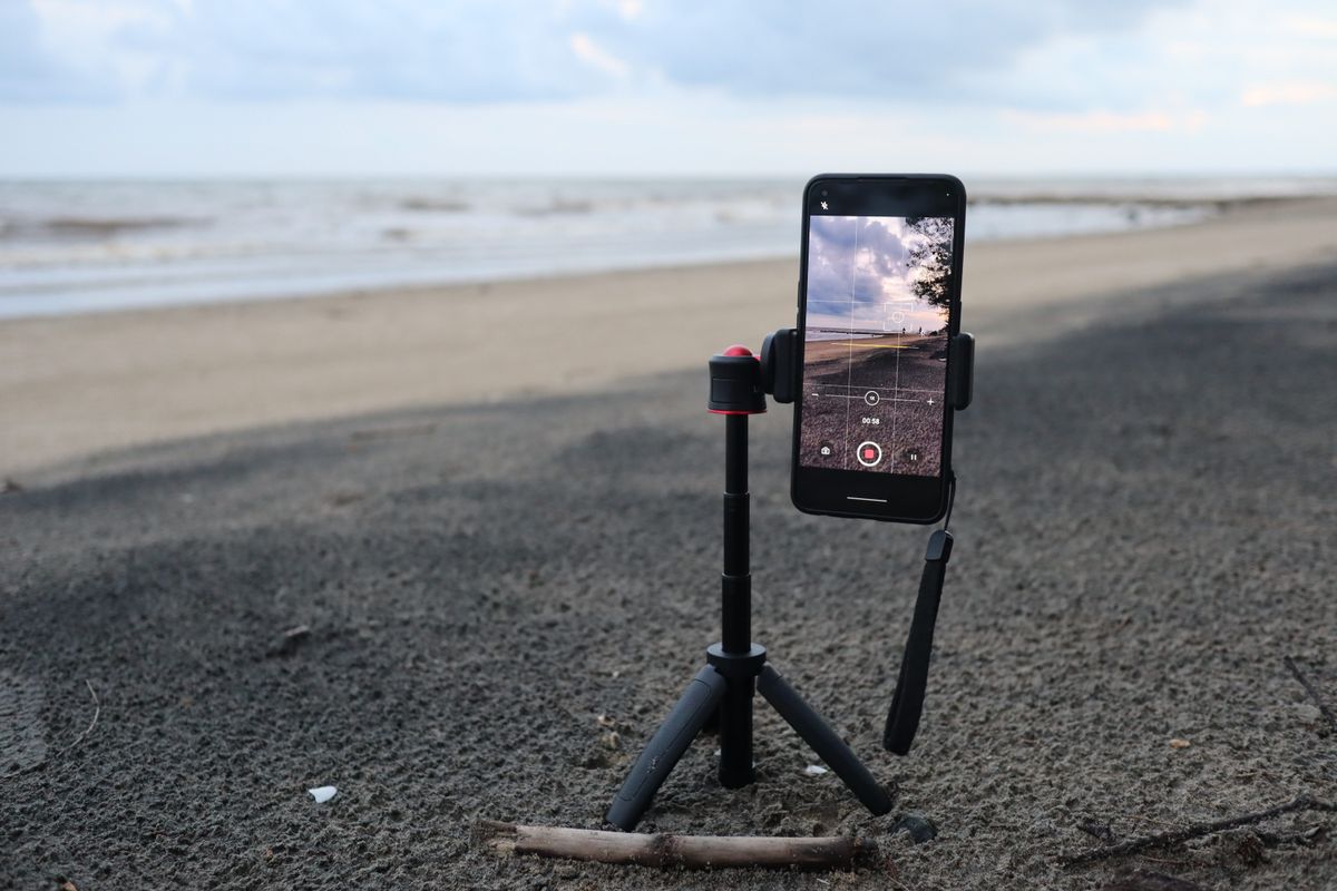 Smartphone on a tripod recording a video