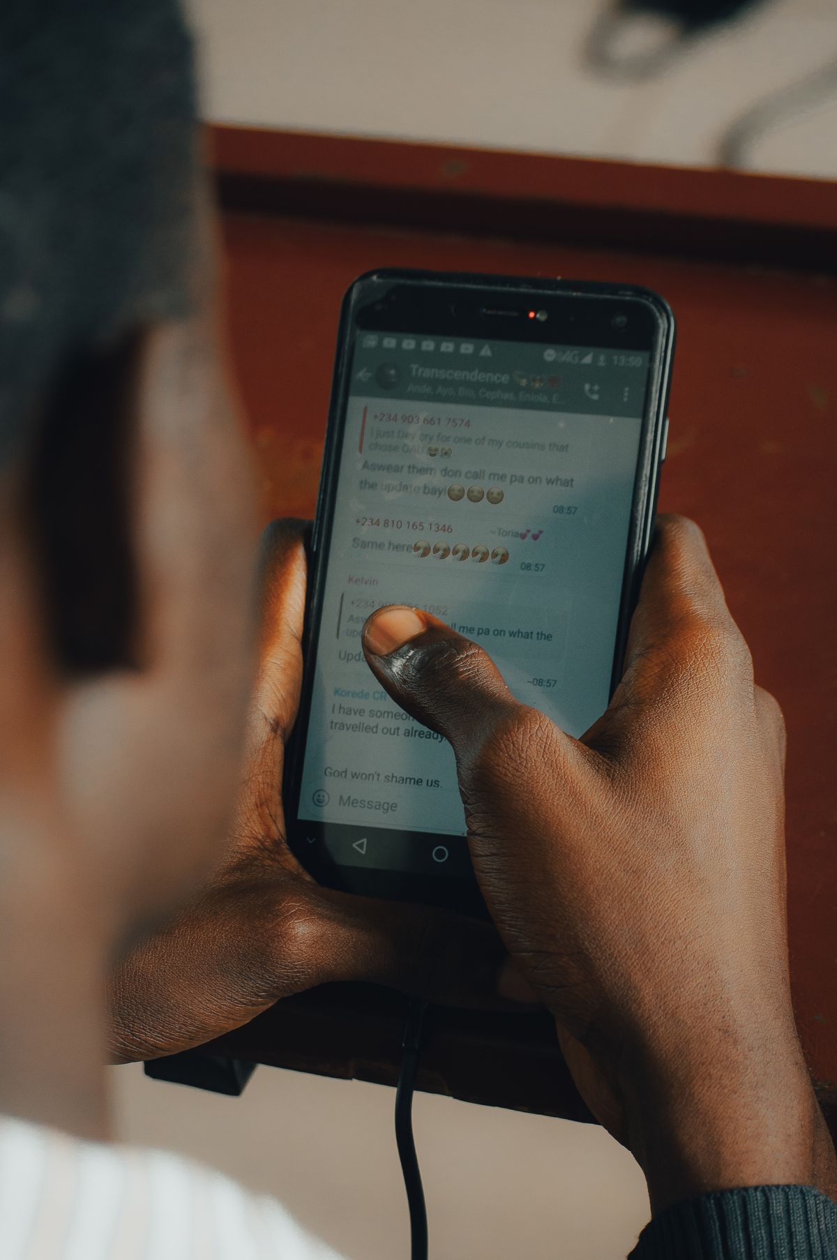Close-up of a smartphone showing chat messages